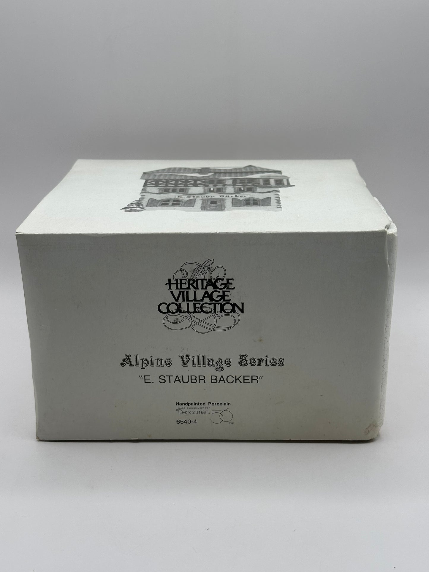 Department 56 - E. Staubr Backer - Alpine Village