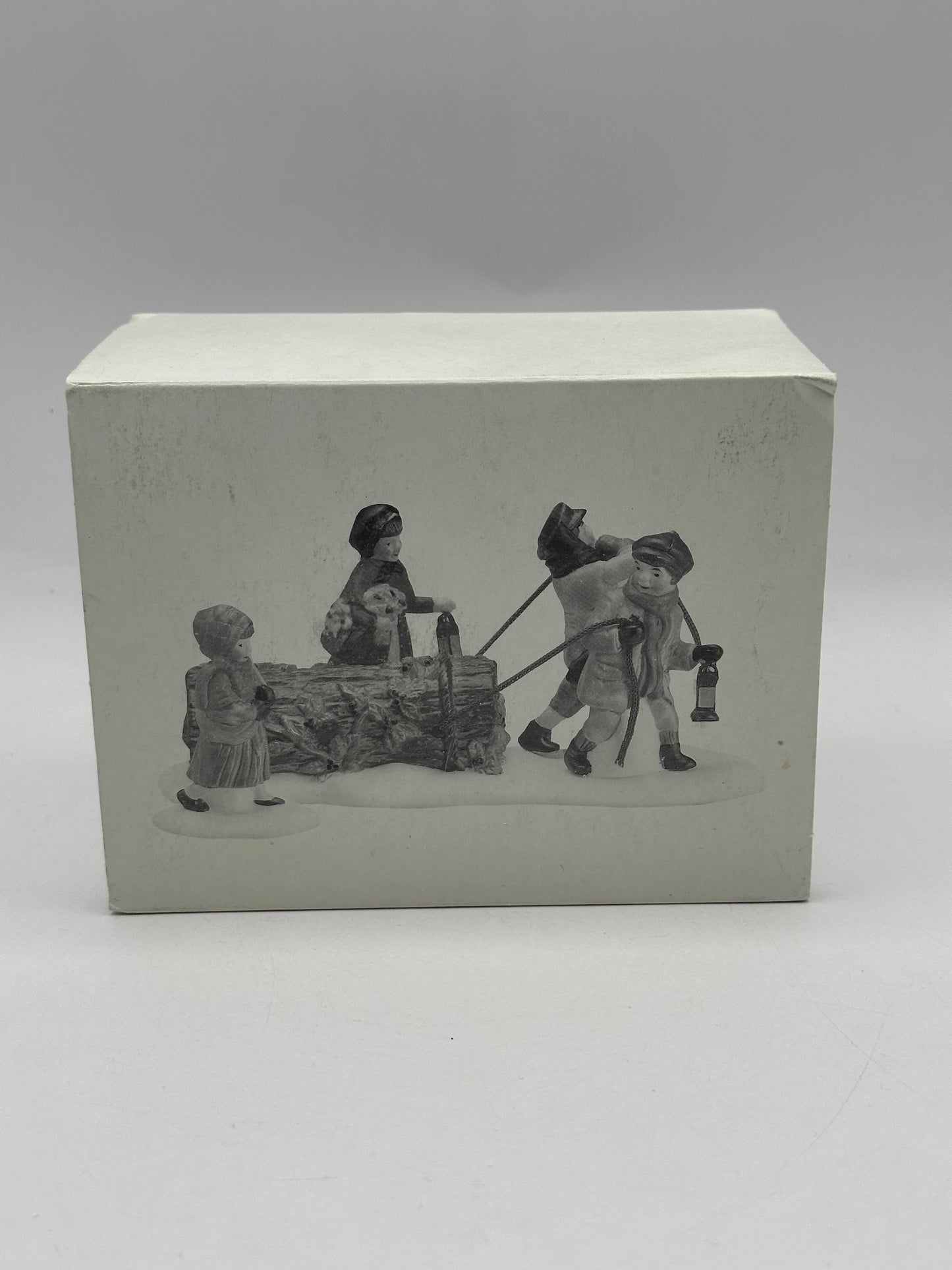 Department 56 - Bringing Home The Yule Log - Dickens’ Village