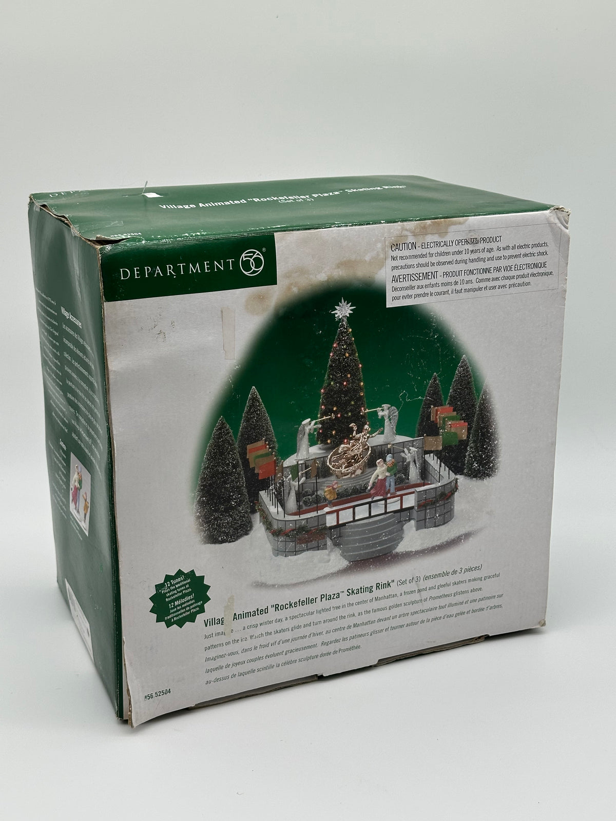 Department 56 - Rockefeller Plaza Skating Rink - Village Accessories (Only One Skater Skates)