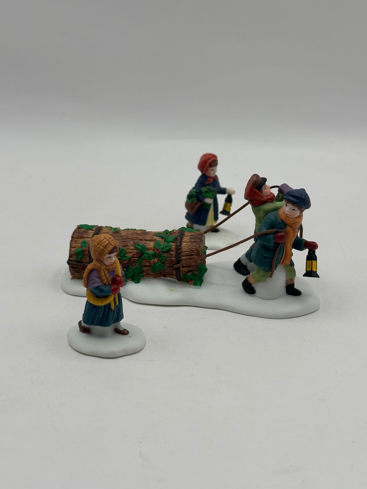 Department 56 - Bringing Home The Yule Log - Dickens’ Village