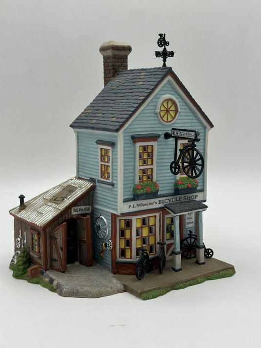 Department 56 - P.L. Wheeler's Bicycle Shop - New England Village