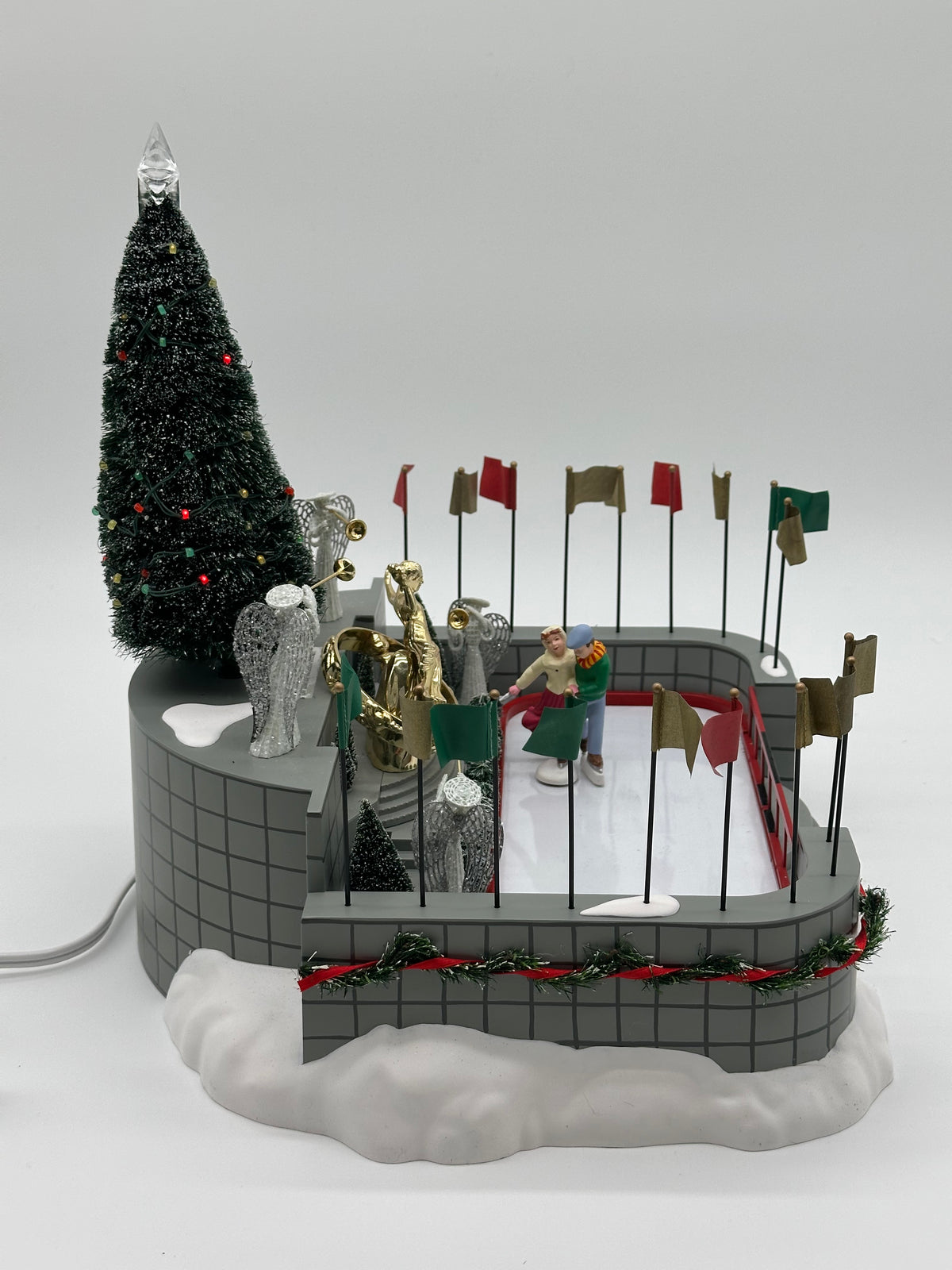Department 56 - Rockefeller Plaza Skating Rink - Village Accessories (Only One Skater Skates)