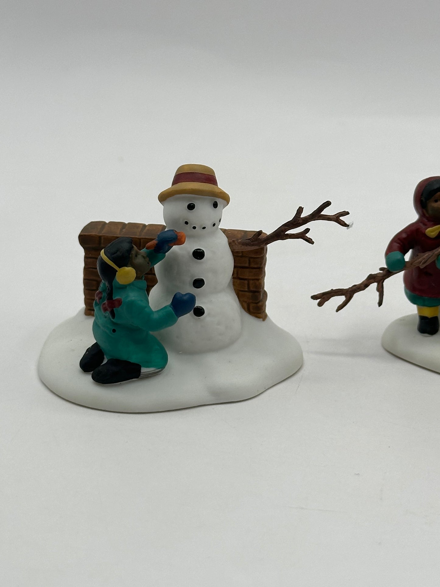 Department 56 - Playing In The Snow - Christmas in the City